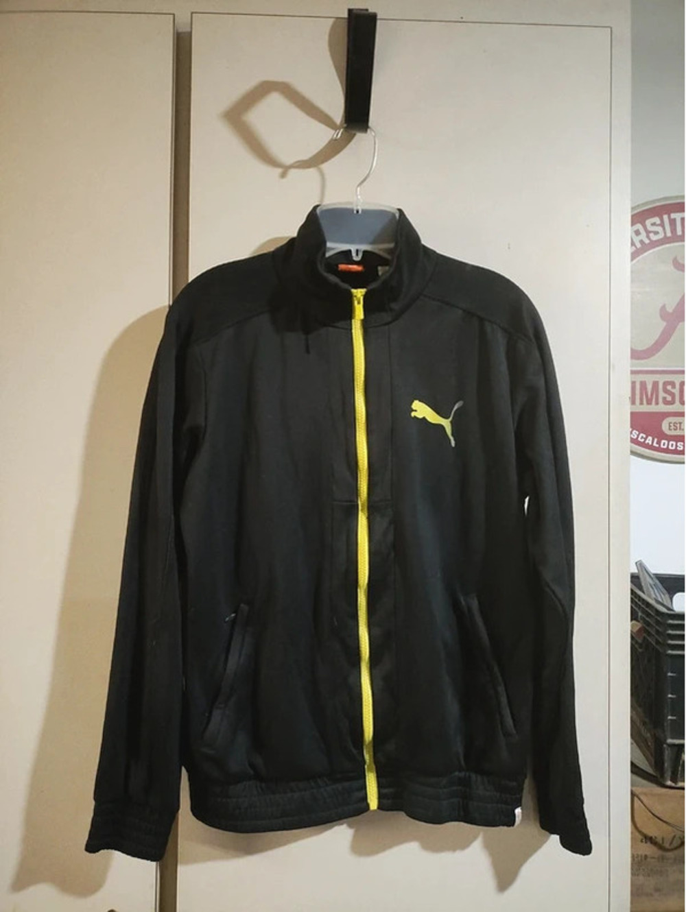 Puma ladies size medium zip up cover up with tiny soccer emblem